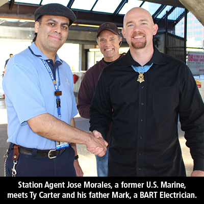 Station Agent Jose Morales, a former U.S. Marine, meets Medal of Honor recipient Ty Carter. Ty's father Mark, a BART Electrician, is seen in the background. 