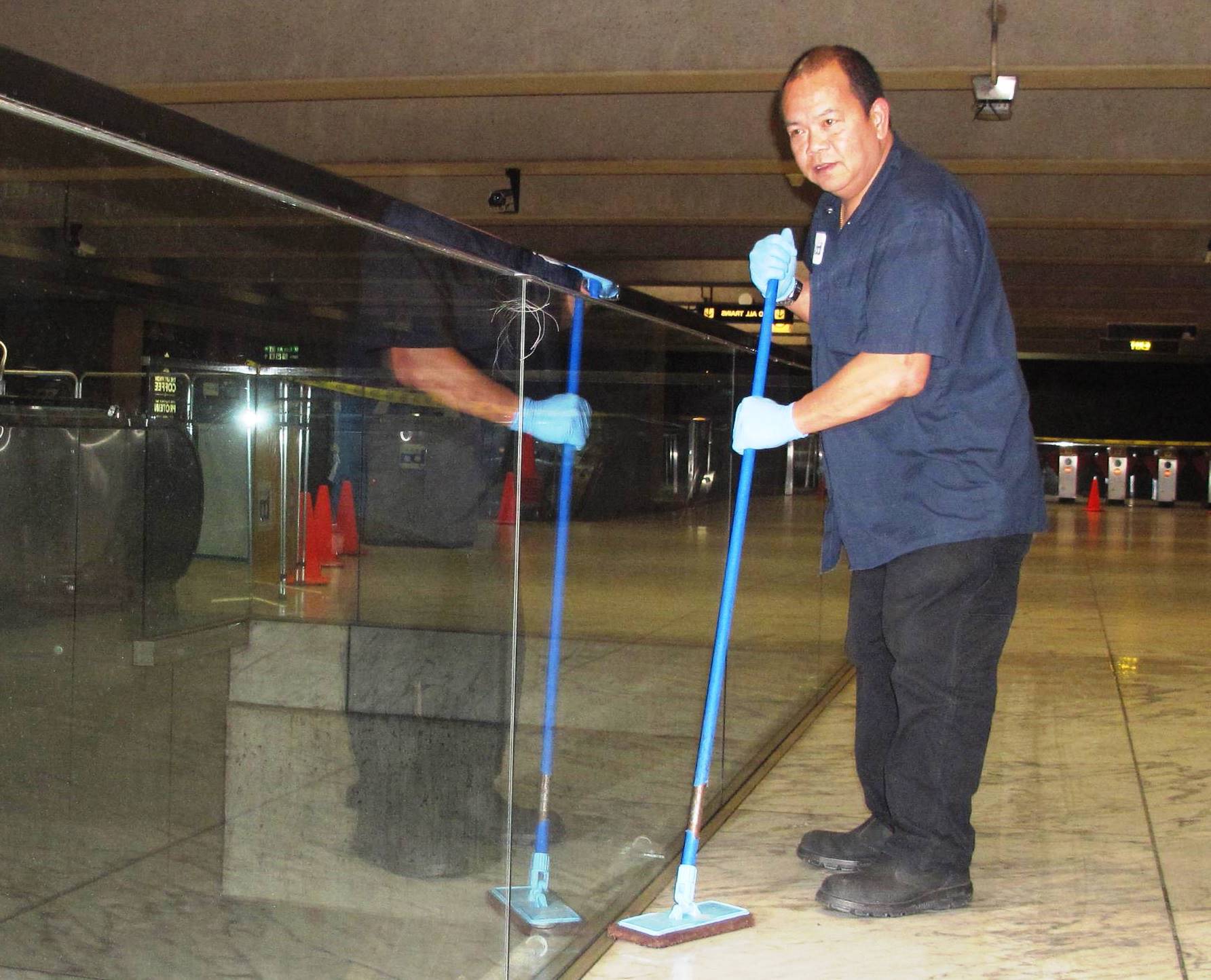 cleaning floor at Embarcadero