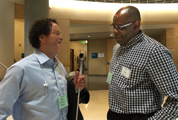 Josh Miele, left, a scientist at the Smith-Kettlewell Eye Research Institute, with BART's Dr. Ike Nnaji
