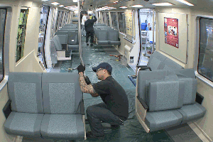 worker installs new seats