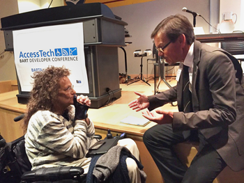 Marilyn Golden of the Disability Rights Education and Defense Fund, left, with BART Director Robert Raburn