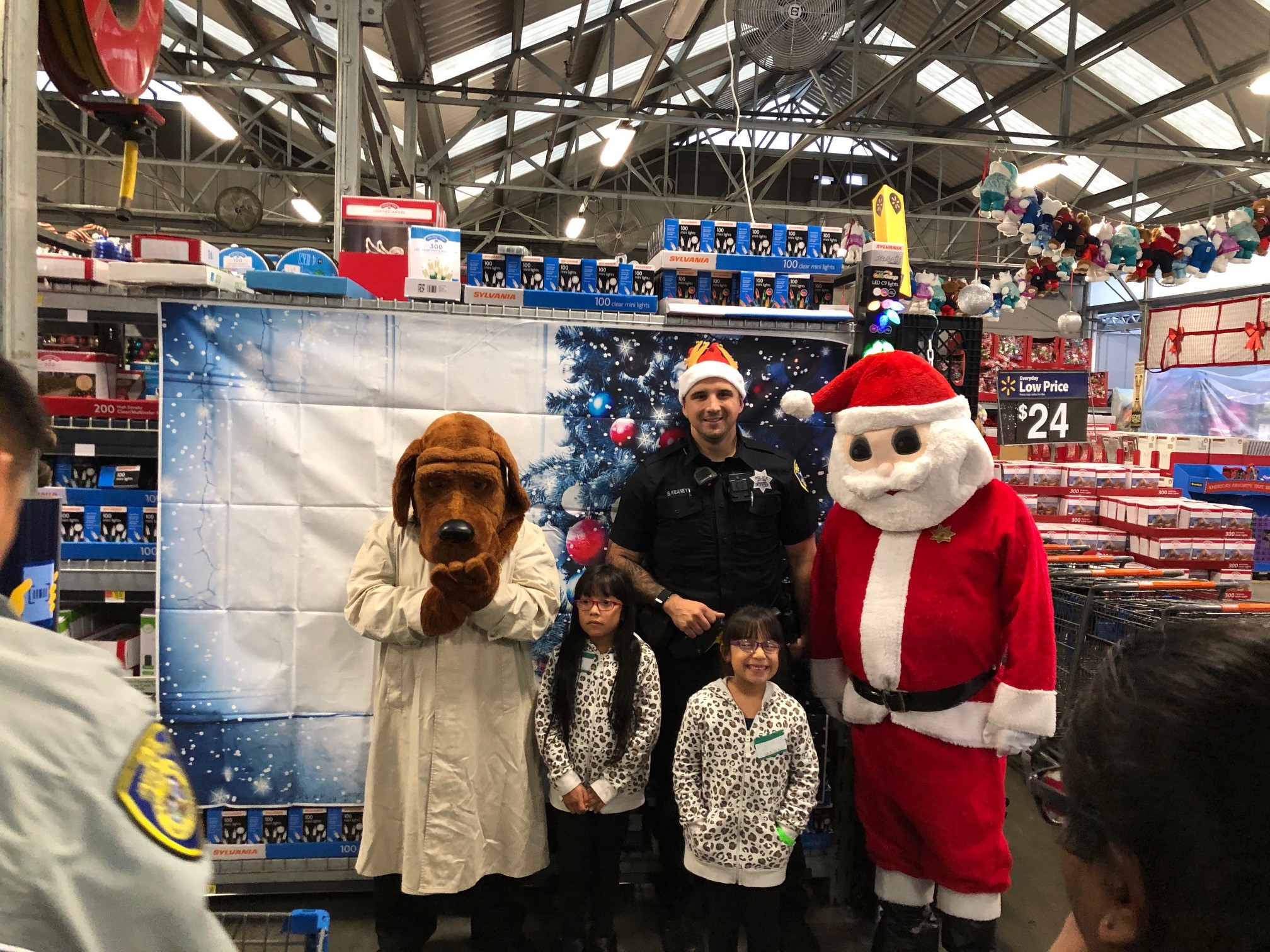 Shop with a Cop, with Santa and McGruff the Crime Dog