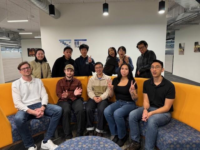 A photo of newly hired junior engineers. Pictured: (Back row left to right) Venus Ku, Christian Chaves, Hein Htet San, Mariela Gonzalez, Jia Wu, and Richard Devera. (Front row left to right) Artem Morozov, Brendan Dolan, Kevin Pham, Audrey Chuakay, and Peyton Hill. Not pictured: Jacob-Crispulo Rojo.  
