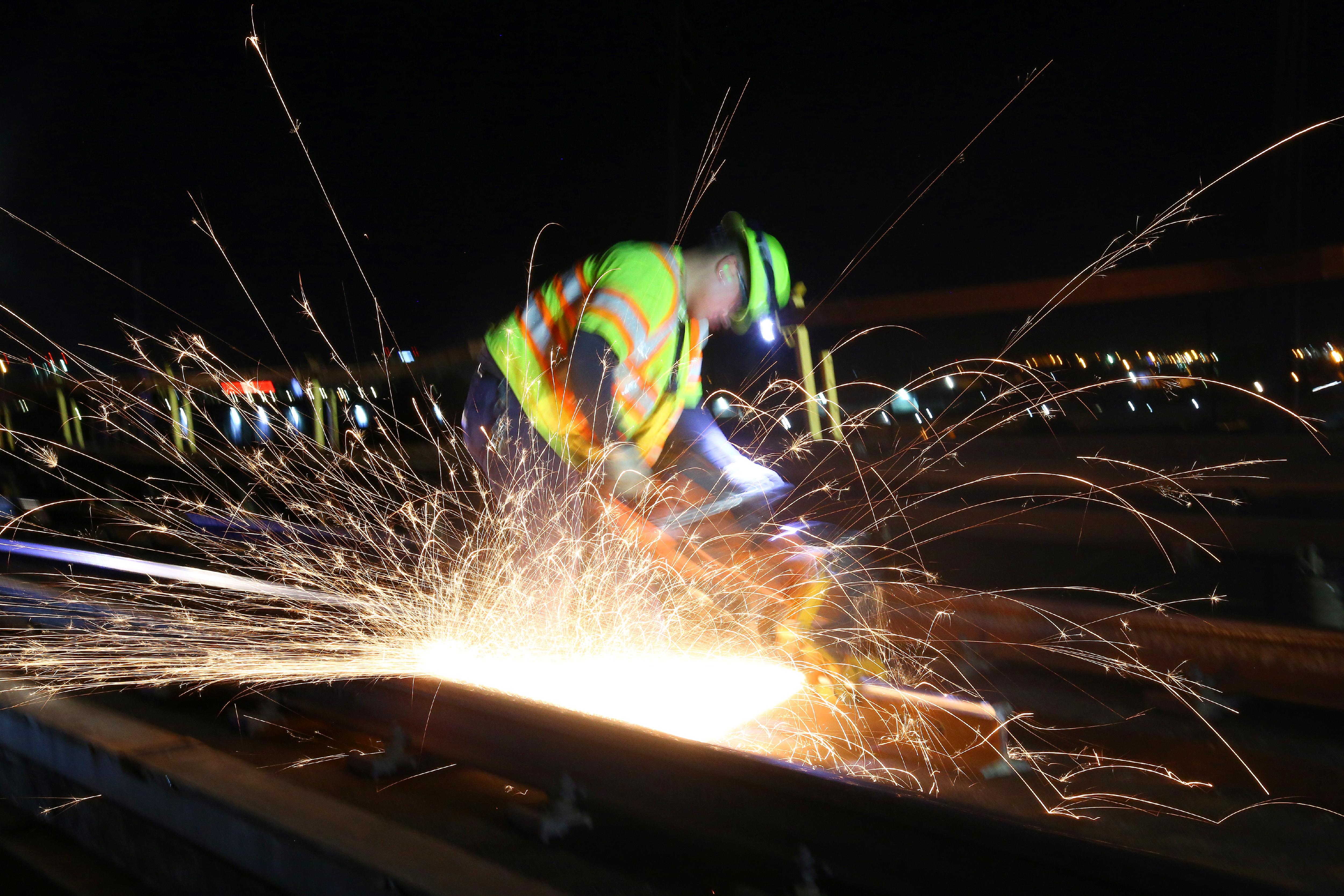 Crews working at night to make repairs to the trackway