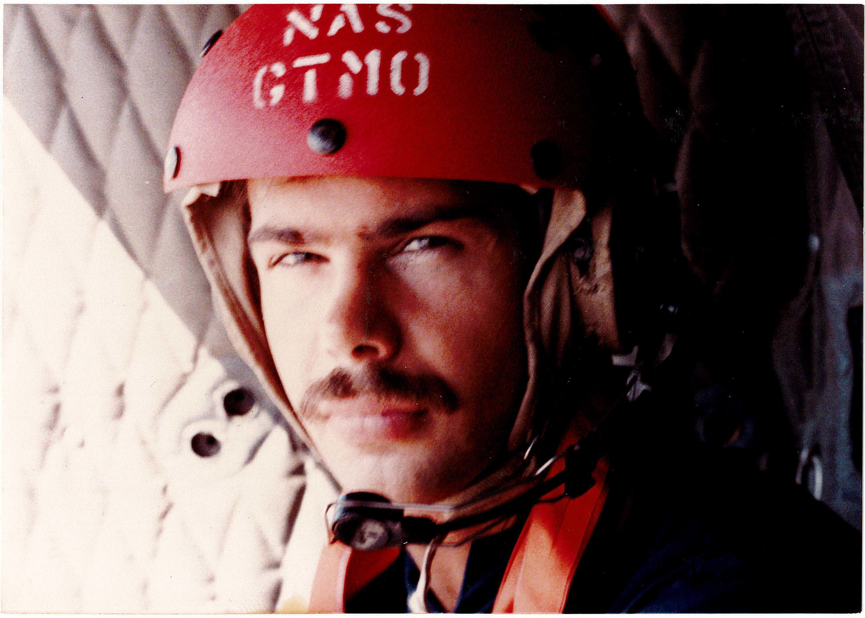 Jim Allison in a helicopter while serving in the U.S. Navy