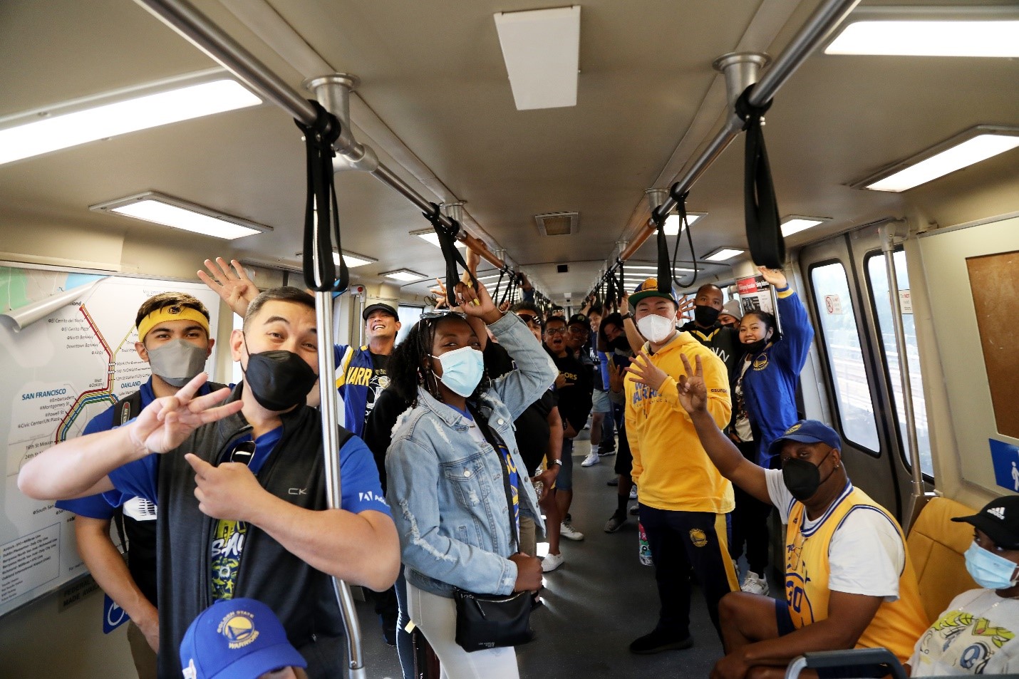 Warriors fan on board a train