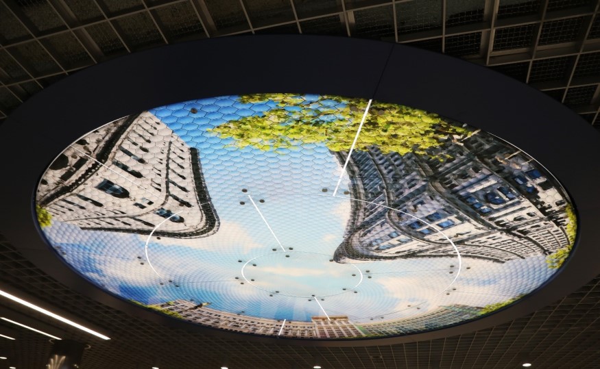 A bubble tile motif is seen overlaying Stephen Galloway’s “Elysium” at Powell St. Station. 