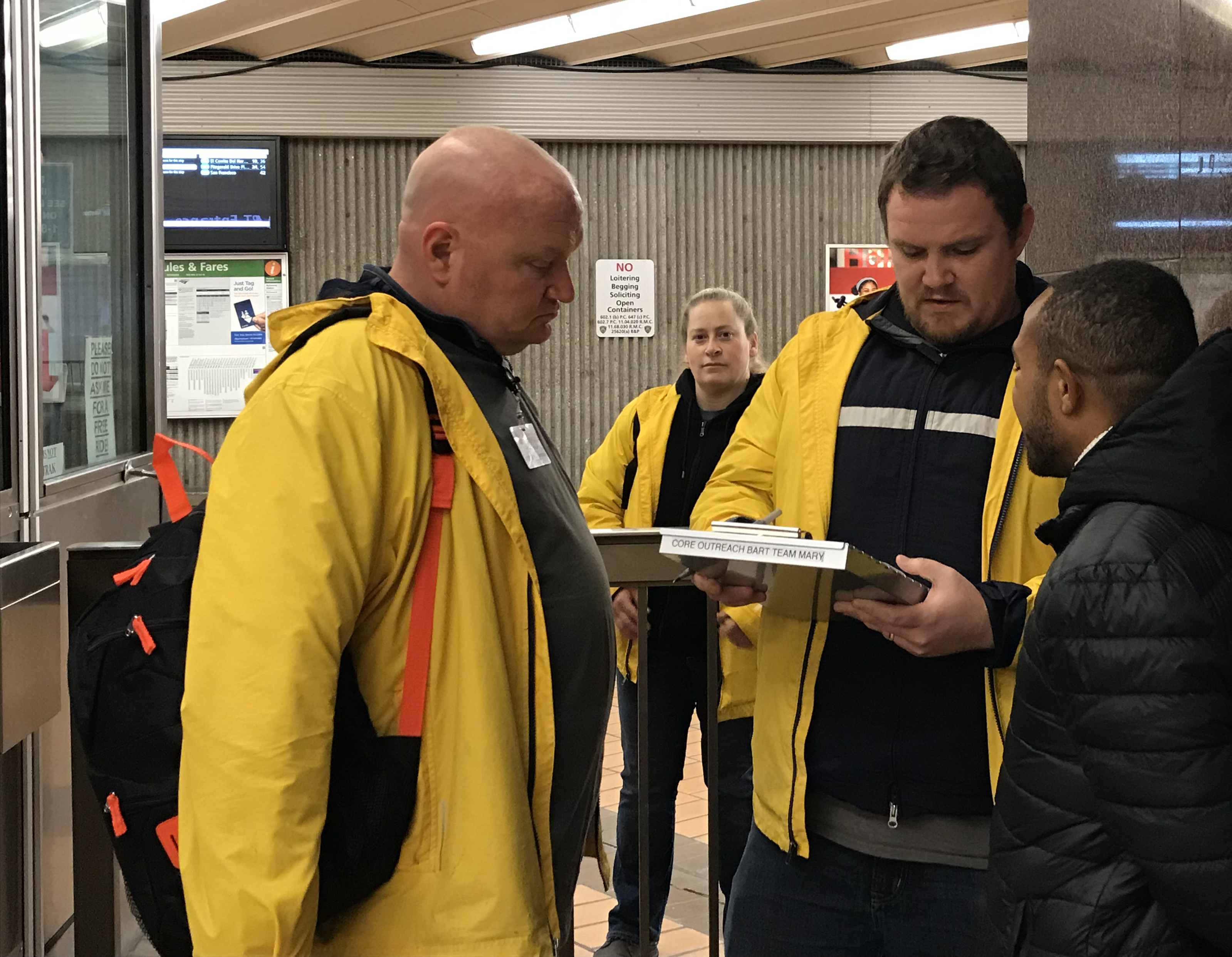 team helps a person get to shelter