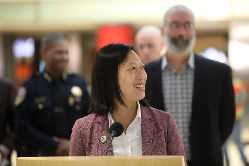 Director Janice Li speaks at the ribbon cutting for Powell St. Station modernization on Nov. 22, 2022.