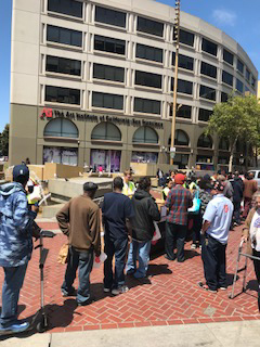 people line up for outreach from Salvation Army