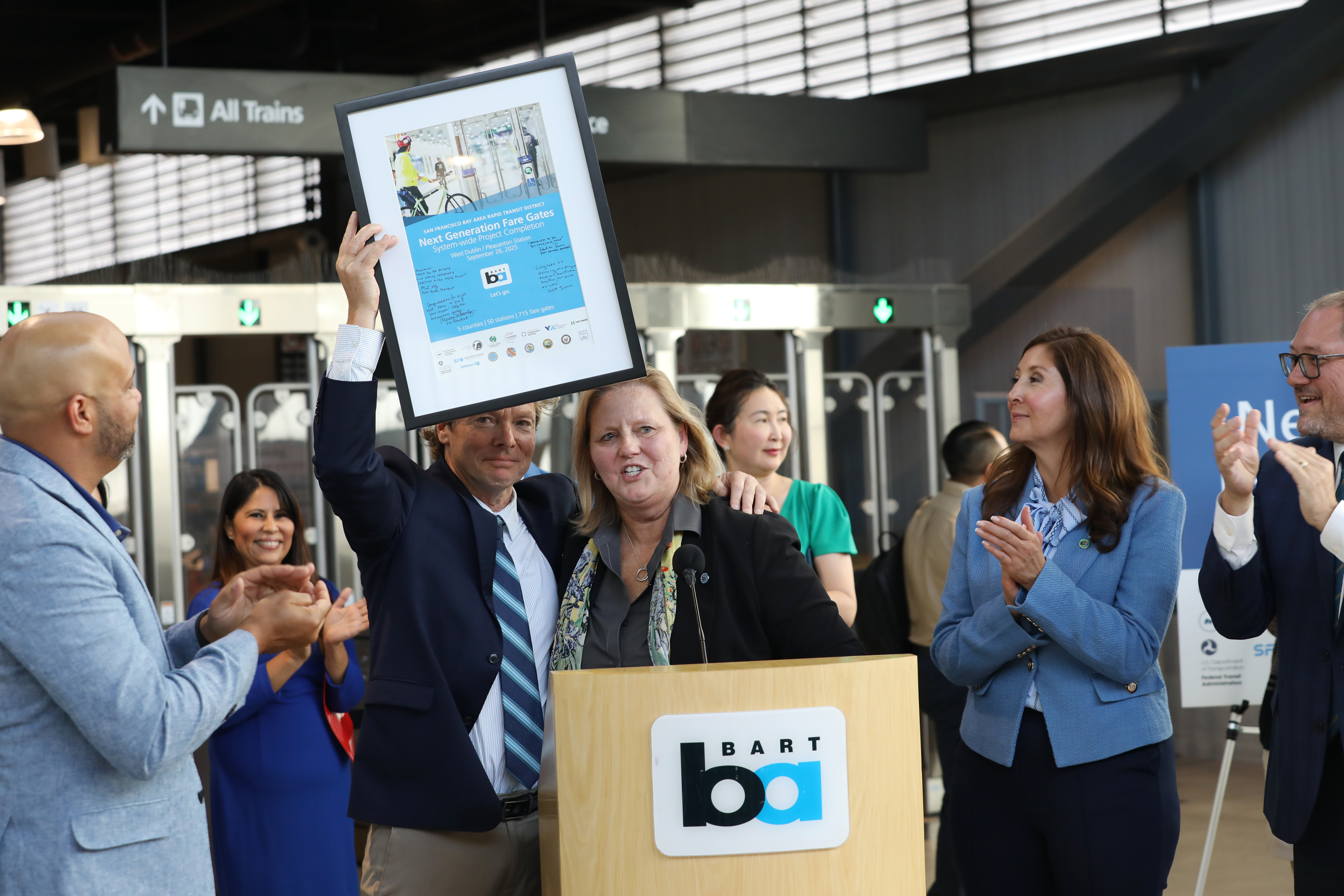 General Manager Bob Powers and Assistant General Manager Sylvia Lamb at Next Generation Fare Gate Ribbon Cutting