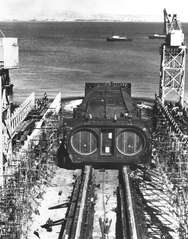 A section of the Transbay Tube being lowered into San Francisco Bay.
