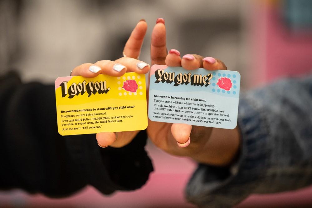 Bystander intervention cards that were launched as part of Not One More Girl Phase II. The two distinct wallet-size cards are now available to riders to discreetly hand to people to signal they need help or support, or to notify someone being harassed that you are there to help and support them. They are available for pickup at Station Agent booths.  