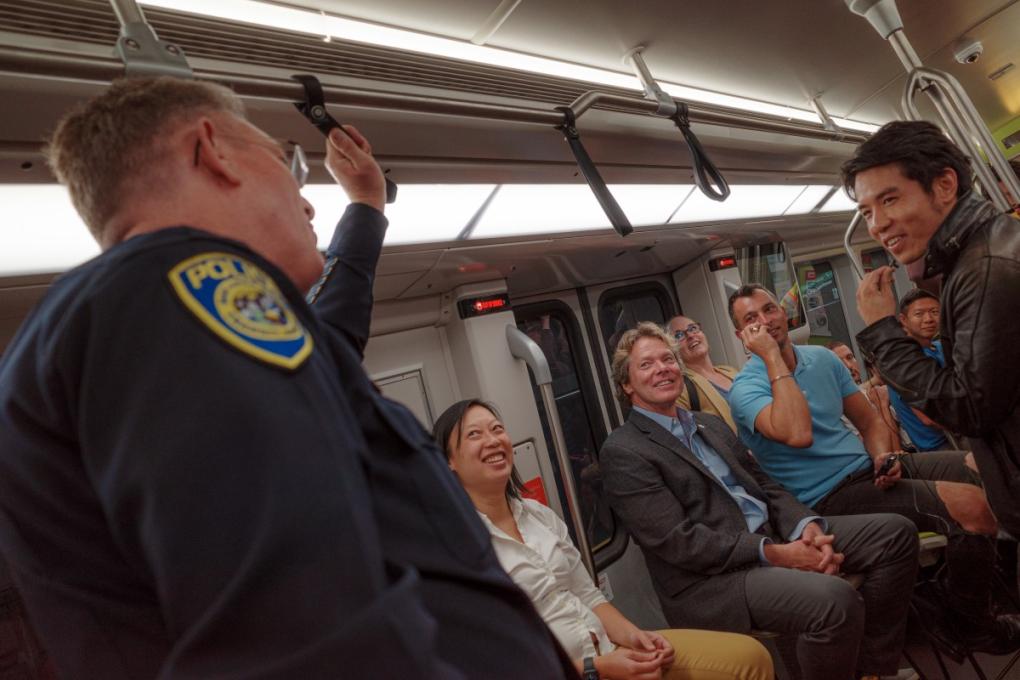 From left to right: Interim Chief of BART Police Kevin Franklin, BART Board President Janice Li, BART General Manager Bob Powers, and Manny Yekutiel during a public conversation on a moving BART train on Friday, Sept. 8, 2023. 