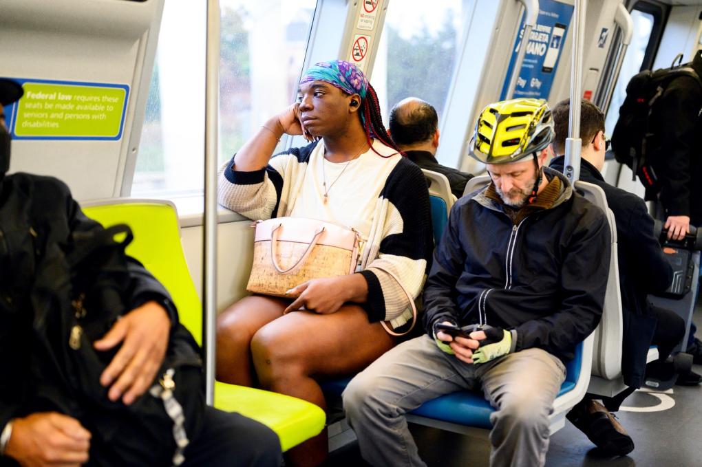 People riding BART