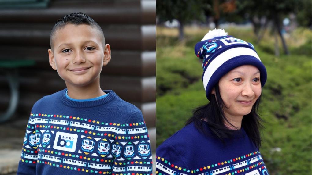 A kid in a BARTy sweater and woman in a beanie