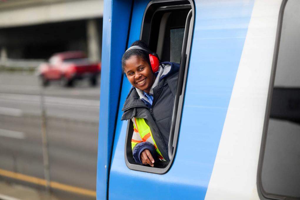 A train operator in a cab