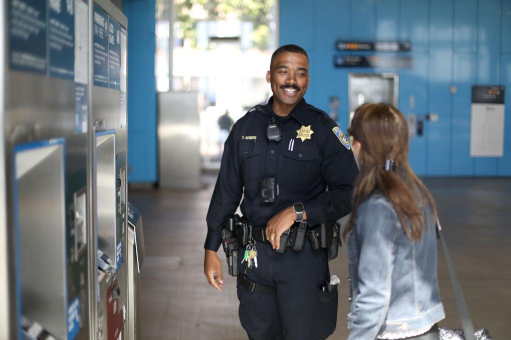 BPD officer talks to a passenger