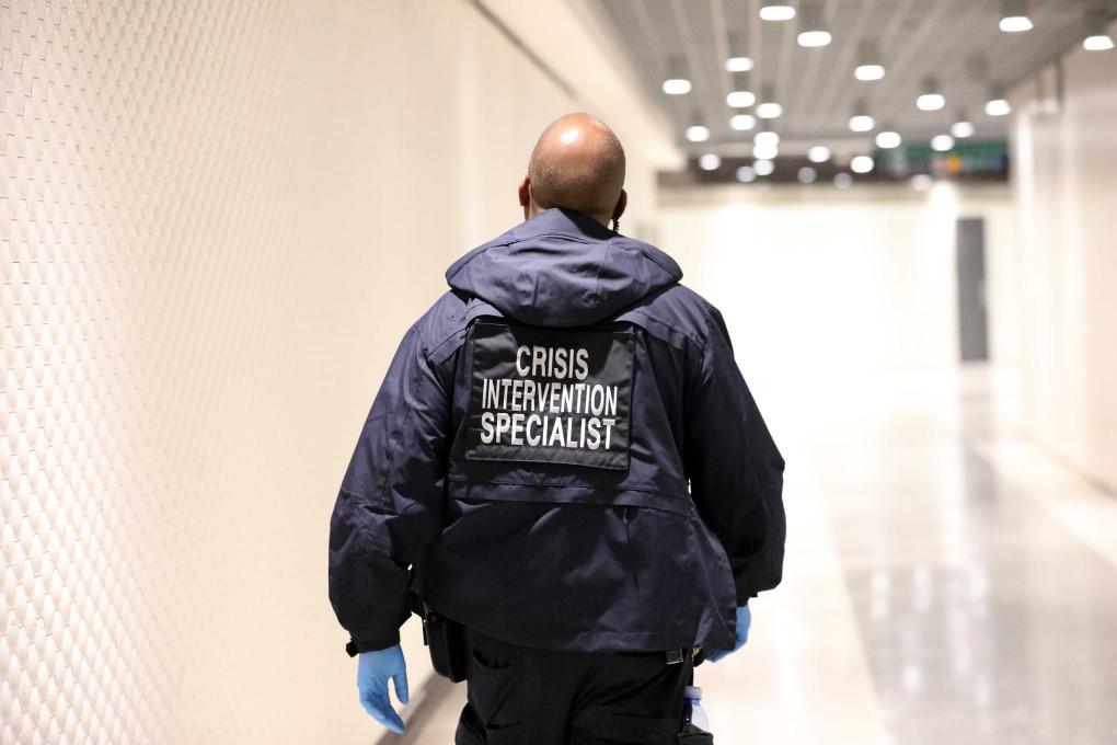 CIS Rahman Bagby walks down a hallway.