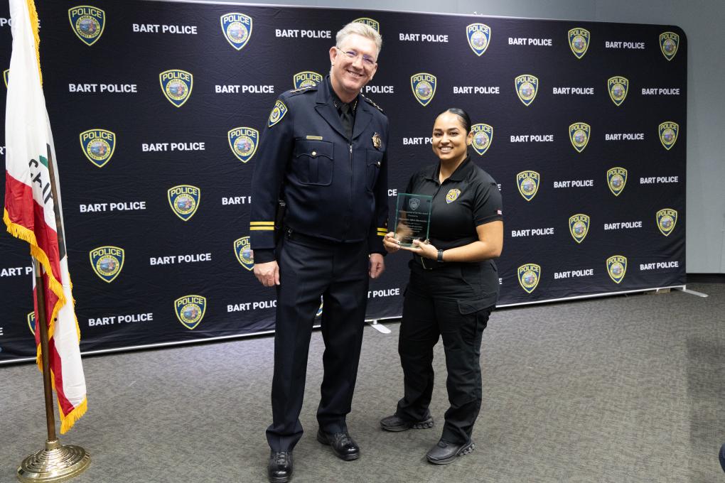 A photo of a BPD awards honoree with Chief Kevin Franklin