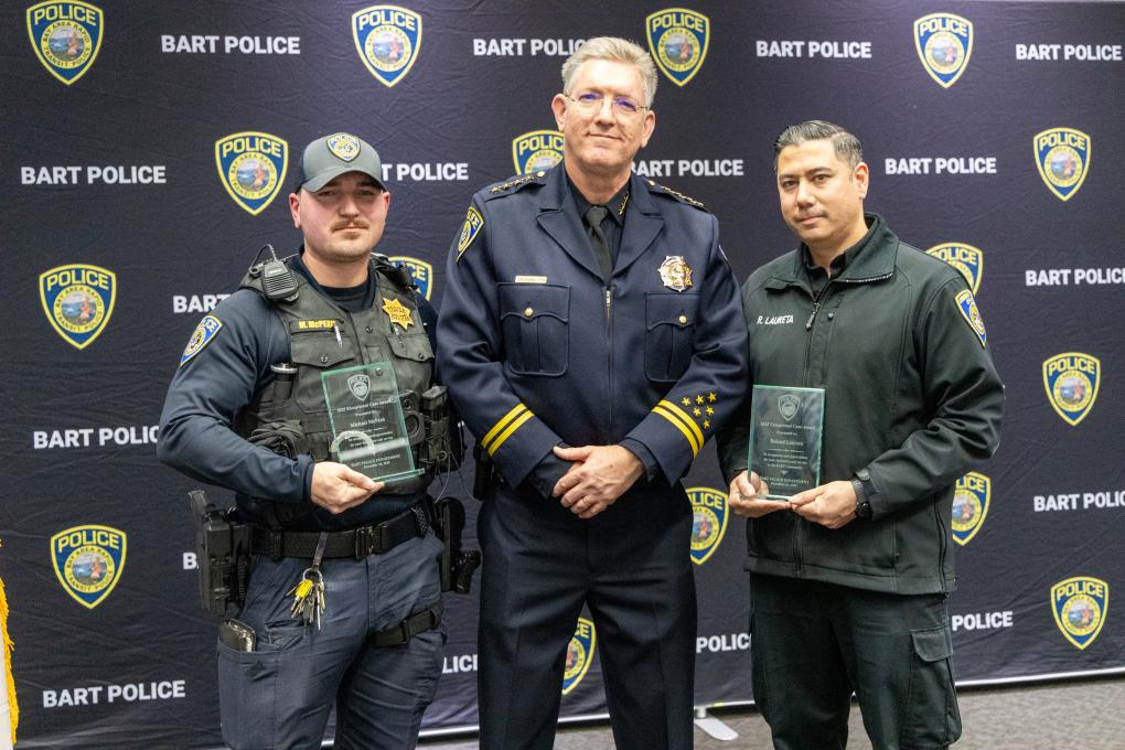 A photo of a BPD awards honoree with Chief Kevin Franklin