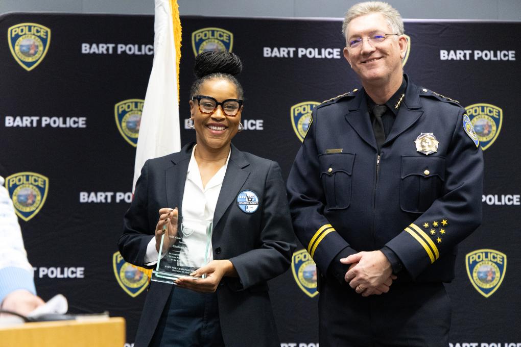 A photo of a BPD awards honoree with Chief Kevin Franklin