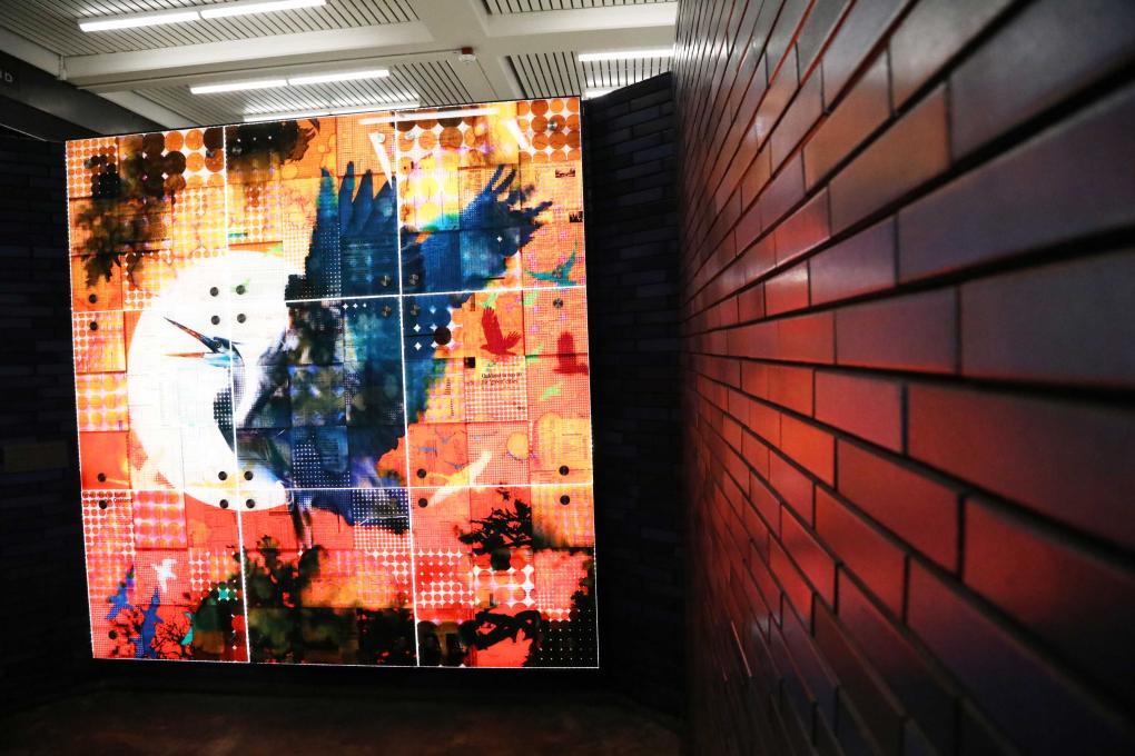 Example of art in one of the stairwell lightboxes​