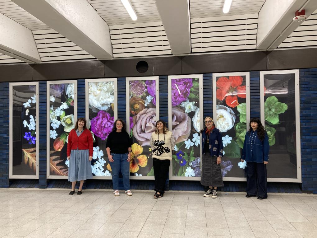 A photo of the artists in front of Untitled (Samin's Garden)